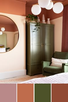 a bedroom with green furniture and pink walls