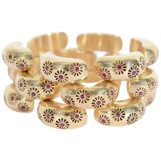 This Retro gold bracelet is most unusual because of the circular design entirely inlaid with rubies. The links are typical of the Retro era but the addition of the ruby pattern makes it far out of the expected. The bracelet is 7 5/16" in length. It has two additional links that can either lengthen the bracelet or be converted to earrings. It is 1.25" wide. Retro Necklace, Retro Era, Ruby Bracelet, Gold Armband, Swarovski Necklace, Unusual Jewelry, Antique Diamond, Jewelry Gold, Diamond Gemstone