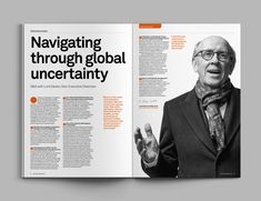 an open magazine with the title navigating through global uncertainy on it