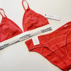 Calvin Klein Modern Cotton Triangle Bralette Size Xl Ribbed Bikini Size Large Color: Strawberry Shake (Red/Orange) The Set Includes A Comfortable And Stylish Logo Bralette, With Adjustable Multiway Straps, And Padded Hook & Eye Closure. The Matching Ribbed Bikini Panty Is Designed With V-Front Shaping, A Logo Tag, And Stretch Fabric For Breathable Comfort. Made With Blended Cotton Fabric, This Bralette Set Is Machine Washable And Easy To Maintain. No Flaws, Removed From Original Packaging For Ph Calvin Klein Seamless Swimwear For Beach, Calvin Klein Seamless Swimwear For Summer, Calvin Klein Summer Swimwear Briefs, Calvin Klein Red, Stylish Logo, Triangle Bralette, Womens Calvin Klein, Bra Sizes, Women's Intimates