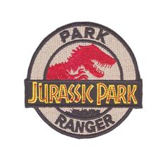 a patch with the words, park ranger and a dinosaur on it's back