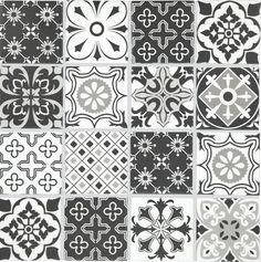 black and white tiles with different designs on them, all arranged in the same pattern