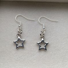 Handmade Silver Star Earrings. Fish Hook. Unused. In Good Condition. Tags: Handmade. Handmade Earrings. Handcrafted Earrings. Handcraft Earrings. Handcrafted Earrings. Handmade Silver Earrings. Handmade Silver Charm Earring. Handmade Charm Earring. Handmade Silver Charm Earrings. Handmade Charm Earrings. Handmade Charm Earring. Charm Earring. Earring. Earrings. Handmade Earrings. Silver Star Earring. Silver Star Earrings. Silver Earring. Silver Earrings. Earring. Earrings. Silver. Fish Hook Earr Silver Star-shaped Earrings With Ear Wire, Silver Star-shaped Earrings, Silver Star-shaped Pierced Earrings, Silver Star Charm Earrings For Everyday, Silver Star-shaped Earrings As Gift, Nickel-free Star-shaped Earrings For Jewelry Making, Silver Earrings With Star Charm For Everyday, Handmade Silver Star Earrings, Star Earrings Silver