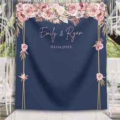 a wedding backdrop with pink flowers and greenery