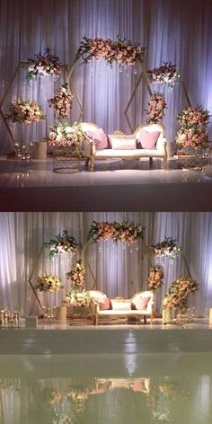 the stage is set up for an event with flowers and greenery on it's sides