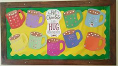 there are many different colored mugs on this bulletin board with the words, help chocolate make a hug from someone else