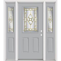 the front door is painted gray and has two glass panels with gold designs on them