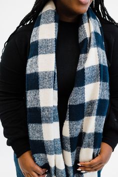 Seriously, is there anything that says “fall is here!” more than a buffalo plaid scarf? The Lorelai is super soft, never scratchy, and features adorable tassels at each end. And the navy and cream pattern means pairing it with your other outfits will be a breeze! Details: 63” wide x 24” long Cozy Blue Scarves For Fall, Cozy Blue Scarf For Fall, Blue Scarves For Fall, Buffalo Plaid Scarf, Pattern Meaning, Fall Is Here, The Navy, Other Outfits, Buffalo Plaid