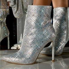 Cinderella Slipper But Make It A Bootie! We Are In Love!! Gorgeous Silver Rhinestone Covered Bootie Featuring A Pointed Toe, Inside Zipper Entrance, And 4 In. Stiletto Heel. Excellent Quality! We Love For Brides Or Any Special Occasion! Tts, Size Up If In Between Silver Fitted Boots For Wedding, Glamorous White Boots With Rhinestones, Elegant Silver Boots With Rhinestone Fringe, Glamorous White Rhinestone Boots, Silver Glitter Boots With Round Toe, Glamorous Silver Pointed Toe Boots, Silver Pointed Toe Boots With Rhinestone Rivets, Silver Rhinestone Ankle-high Boots, Glamorous Silver Closed-toe Boots