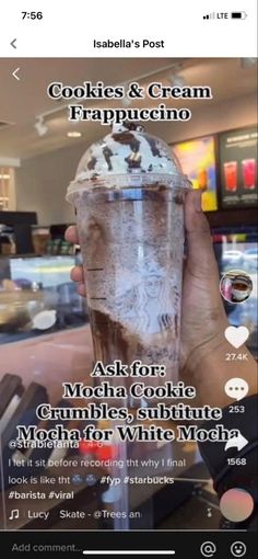 someone holding up a cup with ice cream in it and the caption reads, cookies & cream frappuccino