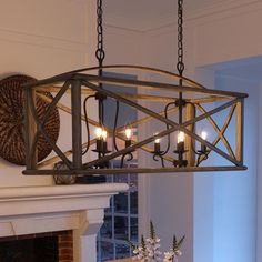 A beautiful UQL3002 Farmhouse Chandelier, 19.5H x 40.75W, Wood Grain Metal with Antique Black Finish from the Barnsley Collection by Urban Ambiance Style Toscan, Luxury Farmhouse, Indoor Chandelier, Slanted Ceiling, Tuscan Design, Farmhouse Chandelier, Linear Lighting, Tuscan Style, Chandelier Style