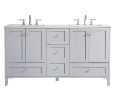 a white bathroom vanity with two sinks and three faucets on the top side