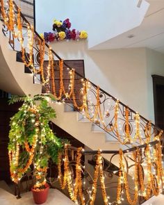 the stairs are decorated with garlands and lights