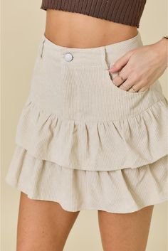 Introducing our Gemma Corduroy Ruffled Mini Skirt in ivory! Featuring belt loops, a button closure, and a ruffled hem, this skirt is perfect for those who love a touch of whimsy in their wardrobe. Paired with shorts, it's the ultimate combination of comfort and style. (Shorts included, exclamation optional.) Belt Loops Button Ruffled Hem Ruffled Mini Skirt, Tiered Mini Skirt, Style Shorts, Teacher Style, Curvy Jeans, Makeup Bags Travel, Good Habits, Hats For Sale, Sneaker Heels