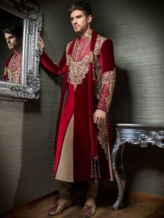 <p><strong>Sherwani:</strong><br />Color: Bulgarian Rose<br />Fabric: Velvet<br />Bulgarian rose velvet sherwani features rich quality embellishments on sleeves, collar and front<br />Buttons closure front</p> <p><strong>Inner:</strong><br />Complimented with tan kurta and churidar pajama</p> <p><br /><br /><strong>Additional Accessories:</strong><br />Kolhapuri/Saleem Shahi shoes: <strong>US$50</strong><br />(Made with sherwani material & embroidery)<br />Tied pre-made Turban: <strong>US$150</s Velvet Sherwani, Groom Sherwani, Mens Sherwani, Virginia Beach Virginia, Hebrew Israelite, Wedding Sherwani, Rose Fabric, Rose Velvet, Bulgarian Rose