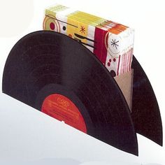 an old record player has been decorated with colorful wrapping paper