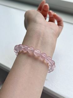 ❤️Add a touch of elegance and tranquility to your jewelry collection with this beautiful Rose Quartz bracelet. Crafted from smooth, round beads, this bracelet captures the gentle pink hue of Rose Quartz, known as the stone of universal love. ▫️Material: Genuine Rose Quartz ▫️Bead Size: 10mm ▫️Bracelet length: fits 16cm+ = 6.3 inches ✅Care Instructions: ✔️Keep away from harsh chemicals and prolonged exposure to water. ✔️Clean with a soft cloth to maintain its natural shine. 🔺Please note:  ☑️All Crystal Bracelet With Round Beads For Meditation, Meditation Crystal Bracelet With Round Beads, Pink Beaded Bracelets For Meditation, Elegant Rose Quartz Crystal Bracelet For Meditation, Elegant Hand-strung Rose Quartz Crystal Bracelet, Elegant 8mm Beads Crystal Bracelet For Meditation, Elegant Crystal Bracelet With 8mm Beads For Meditation, Elegant 8mm Beaded Crystal Bracelet For Meditation, Elegant Rose Quartz Crystal Bracelet With Round Beads