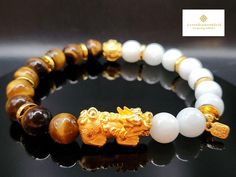 Gift yourself this elegant Lucky Bracelet. Just perfect to make your overall look standout. *Materials: Pure Gold 999 and Citrine *Karat: 24K Pure Gold  *Gold Weight: Approximately 10.76g  *Stone: Approximately 10mm *Front Koi Fish Gold Tube: Approximately 1.33 Inch *Back Koi Fish Tube: Approximately 1.56 Inch *Gold Mantra Length: Approximately  11mm *HANDMADE 🧧Koi Fish symbolizes a lot of meanings. Therefore, it is one of the most favorite animal in China, Japan, and many countries.  It  is a Feng Shui Bracelet, Pixiu Bracelet, Lucky Bracelet, Favorite Animal, Good Marriage, Pure Gold, Koi Fish, Gold Gold, Feng Shui