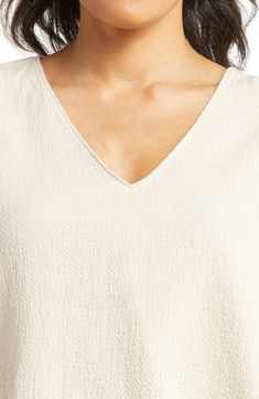 The exquisite fabrication of blissfully soft cotton, along with a boxy fit, upgrades this cropped sleep top to an indulgence. 24" front length; 27" back length (size XS) V-neck Short sleeves 100% cotton Machine wash, line dry Imported Sleep Shirt, Sleep, Short Sleeves, Nordstrom, Size Medium, Fabric