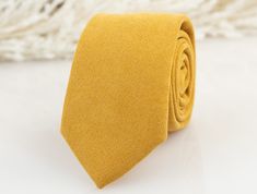 "FREE SHIPPING within USA on orders over $35 and in Canada on orders over $75 This marigold tie will ensure your wedding party get lots of complements while it matches perfectly your wedding theme colors. An elegant floral pattern which is perfect match with Azazie butterscotch, David bridal marigold, light yellow, gold yellow color pallets.  ▶ SIZE: - Adult neckties: Approx. 2.75\" wide at the tip, Approx. 58\" length ▶ MATERIAL: All our ties are handcrafted from high quality imported fabrics. 100% cotton. ▶ LABELS: You can choose \"Yes\" to \"Add personalized labels\". These labels have names, roles, a message and wedding date that is wrapped around ties. Labels are printed on heavy superior quality paper. When ordering, You can provide all information under personalization or Note to Se Classic Yellow Wedding Tie, Wedding Marigold, Yellow Solid Color, David Bridal, Wedding Tux, Suspenders For Kids, Yellow Tie, Wedding Theme Colors, Yellow Ties