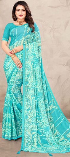 Blue color Saree in Chiffon fabric with Lace, Printed work Traditional Blue Printed Saree, Festive Blue Printed Saree, Festive Printed Blue Saree, Blue Printed Saree, Blue Georgette Saree With Bandhani Print, Festive Blue Digital Print Saree, Blue Bandhani Print Georgette Saree, Blue Floral Embroidered Saree Fabric, Blue Chiffon Saree