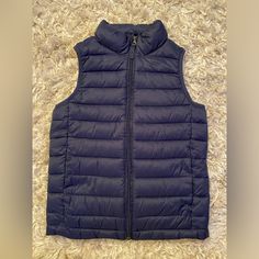 Color: Navy Blue Puffer Vest Water Resistant Size 6/7 Brand New, Never Worn, Without Tags Ask All / Any Questions - No Returns Navy Blue Puffy Vest Outfit, Cheap Blue Vest Outerwear, Blue Puffer Vest, Blue Sporty Vest For Outdoor, Dark Blue Puffer Jacket, Navy Puffer Vest, Navy Blue Vest, Blue Puffer, Puffer Vest