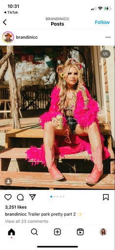 a woman sitting on steps wearing pink boots and holding a coffee cup in her hand