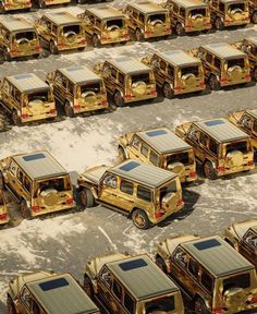 many vehicles are parked together in a parking lot with yellow paint on the top and bottom