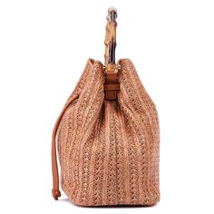 Add a breezy flair to your ensembles in this bucket bag from New York and Company. The Richie is the ideal blend of toughness and style thanks to its robust woven straw fabric and sturdy bambooÃƒâ€šÃ‚Â h andle. Travel Bucket Shoulder Bag In Rattan, Casual Straw Pouch Bag, Travel Rattan Bucket Shoulder Bag, Spring Straw Pouch Bag With Braided Handles, Brown Straw Bucket Shoulder Bag, Spring Woven Brown Bucket Bag, Spring Brown Woven Bucket Bag, Summer Straw Hobo Bag With Woven Leather, Brown Bucket Straw Bag With Adjustable Strap