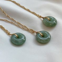 Elegant Jade Necklace - Natural Green Gemstone Pendant Elevate your style with this exquisite jade necklace featuring a natural Myanmar jade gemstone. Known for its soothing energy and timeless beauty, the jade pendant is hand-polished to perfection and carefully set in a high-quality, tarnish-resistant chain. Whether worn alone or layered with other pieces, this necklace adds a touch of elegance and serenity to any outfit. Perfect for everyday wear or special occasions, it also makes a meaningful gift for loved ones. Material: Natural Myanmar Jade, Gold filled twist chain Necklace length: 16"+2" If you have specific details like chain type or length, I can refine it further! Necklace Green Stone, Jade Necklace Pendant, Jade Pendant Necklace, Green Stone Necklace, Jade Gemstone, Necklace Chain Lengths, Necklace Green, Jade Necklace, 14k Gold Necklace