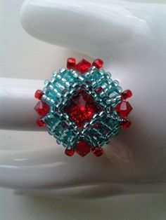 Type : Beaded ring Stil. Handmade Beadwork Materials: 14 mm Rivoli Stone; 4mm Bicones; 8/0 and 11/0 toho seed beads Ring circumference: 6,6 cm Inside diameter: 2,1 cm Thank you for visiting my shop. Red Beaded Rings As Gift, Red Beaded Rings For Gifts, Red Beaded Rings Perfect As Gifts, Beads Ring, Ring Square, Jewelry Swarovski, Beaded Ring, Violet Flower, Rose Necklace