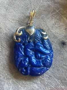 "Estate/ vintage 14KT yellow gold genuine, blue lapis lazuli pendant pearl enhancer Enhancer Pendant measures:1 5/8\" Bail approx. 6mm wide Classic floral carving on lapis Excellent estate condition Weight: 9.2 Grams stamped 14K **Chain not included** Excellent Estate Condition Well Made Int'l buyers: Please be aware of any custom and/or brokerage fees associated with importing this item into your country. These are fees which are payable by the buyer. Necklaces shown are just examples and do no Luxury Blue Carved Jewelry, Luxury Carved Blue Jewelry, Elegant Carved Blue Jewelry, Elegant Blue Carved Jewelry, Blue Oval Carved Jewelry, Blue Carved Oval Jewelry, Blue Carved Pendant Necklace, Formal Lapis Lazuli Pendant Jewelry, Traditional Carved Blue Jewelry