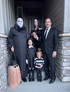 the family is dressed up for halloween