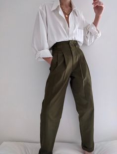 The Na Nin Townes Trousers are inspired by classic 90s style and can be worn in many ways throughout the seasons. Made with lightweight cotton, they are durable, yet allow for movement and feature a relaxed waistline that can be worn high or low on the waist. The thoughtful details of these trousers include pockets, belt loops, cuffs and double pleats. For an elegant classic look, pair with our Fiona Top in cotton poplin and your favorite gold pieces from our In House Jewelry Line. Made In USA 00s Mode, Spiritual Fashion, Queer Fashion, Androgynous Fashion, 가을 패션, Mode Inspiration, Character Outfits, Work Outfits, Look Fashion