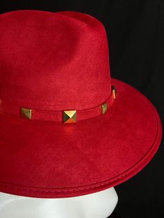 Mexican Handcrafted Red Fedora Hat | El Rosario A complete head-turner & unique Men & Women’s Mexican artisan wool felt hat on this fedora-form in Elegant red color with stud details around hatband, hand embroidered detail around crown & its signature Rosary. A definitive classic from our custom hat collection. SIZE See “Size Chart” below, or CLICK HERE DETAILS Sombrero Box Inner-elastic band (comfortable sizing) Red Short Brim Top Hat For Fall, Red Fedora Felt Hat For Fall, Red Western Style Fedora Felt Hat, Western Style Red Fedora Felt Hat, Red Western Fedora Felt Hat, Western Red Fedora Felt Hat, Red Fedora With Flat Brim, Red Fedora Felt Hat For Party, Red Fedora Hat