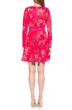 Crochet paneling distinguishes a fit-and-flare dress framed by long sleeves and patterned in bright, colorful blooms. 34 3/4" length (size 2) Hidden back-zip closure Crewneck Long sleeves Unlined 95% polyester, 5% spandex Machine wash, tumble dry Imported Model stats: 5'10" height, 32" bust, 25" waist, 36" hip. Model is wearing size 2. Pink Fitted Long Sleeve Spring Dress, Fitted Pink Long Sleeve Dress For Spring, Pink Fitted Long Sleeve Dress For Spring, Spring Fit And Flare Mini Dress With Flared Hem, Fitted Multicolor Floral Long Sleeve Dress, Fitted Multicolor Long Sleeve Floral Dress, A-line Long Sleeve Floral Dress For Fall, Pink Floral Print Fit And Flare Mini Dress, Fall Floral Print A-line Long Sleeve Dress