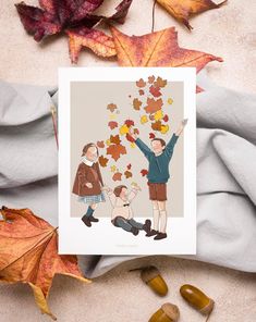 a card with an image of people throwing leaves in the air on top of fall leaves