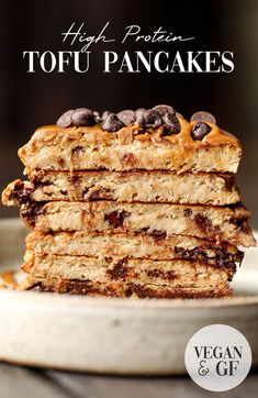 stack of high protein tofu pancakes with chocolate chips on top and text overlay that reads high protein tofu pancakes