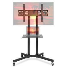 an image of a tv stand with a television on it's side and a sunset in the background