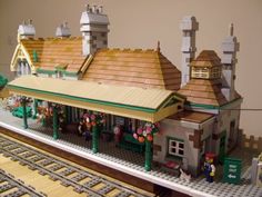 a lego train station is shown on display