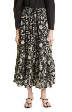 Carefully tucked pleats bring graceful movement to this flowy tie-waist maxi covered in delightful blooms. 39" length (size Medium) 100% cotton Dry clean Imported Black Hibiscus, Shop Mille, Graceful Movement, Printed Ties, Hibiscus, Maxi Skirt, Midi Skirt, Floral Print, Floral Prints