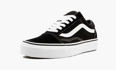 The Vans Old Skool is a timeless canvas-constructed skate shoe.  Universally accepted as one of the most versatile sneaker designs in history, the Old Skool, with its jazzy side stripe, waffle-patterned rubber outsole, and low-profile appearance, comes in an array of colorways.  None, however, have the ubiquitous appeal as this black and white version.  Simplistic yet sturdy black canvas and suede comprise the upper, while a vulcanized white rubber midsole and grippy gum bottom ensure the Vans O White Leather Vans, Vans Old Skool Black, Black And White Vans, Black White Shoes, Leather Vans, Old Skool Black, Black And White Shoes, White Vans, Stadium Goods