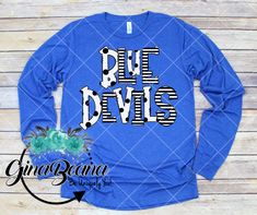 Blue Devils School Spirit Long Sleeve.. Custom to match your school colors Personalize it with a name on the back This tee fits true to size and is a UNISEX fit HOW TO ORDER: Select your size and get your shirt!. This updated unisex essential fits like a well-loved favorite, featuring an irresistibly soft cotton blend, crew neck and short sleeves. 4.8oz., 100% combed and ring-spun cotton 40 single Retail fit Side-seamed Tear Away label Shipping: Your Tee will ship with in 1-3 business days. We d Collegiate Blue Tops For Cheerleading, Blue School Spirit T-shirt With Team Name, Blue T-shirt With Team Name For School Spirit, Pre-shrunk Long Sleeve College T-shirt, Blue School Spirit T-shirt For Fan Gear, Blue School Spirit Tops For Cheerleading, Blue Tops For Cheerleading With School Spirit Style, Blue Tops With Team Name For Game Day, Blue Letter Print Top For Game Day