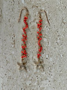 Starfish Earrings featuring a delicate aqua coral rosary chain accented with a CZ starfish.  Gold filled ear wires. Earrings measure 3 inches. Handmade GIFT BOXED Star Charm Drop Earrings For Beach, Starfish Charm Dangle Jewelry, Starfish Charm Dangle Earrings For Jewelry Making, Beach Dangle Jewelry With Star Charm, Coral Jewelry With Dangling Beads For Gift, Diy Pumpkins Crafts, Beachy Earrings, Starfish Earrings, Coral Earrings