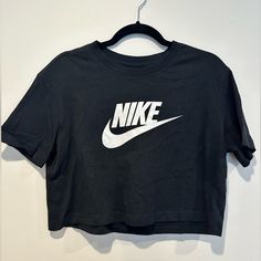 Brand New Black Crop Tee. Thanks For Looking! Nike Black T-shirt For Spring, Nike Basic Tops For Streetwear, Basic Nike Tops For Streetwear, Trendy Nike Top With Letter Print, Nike Basic Top With Graphic Print, Nike Basic Graphic Print Top, Black Nike Cotton Top, Nike Black Cotton Tops, Nike Basic Tops With Letter Print