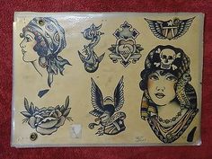 an old school tattoo sticker on a red towel with the image of women and skulls