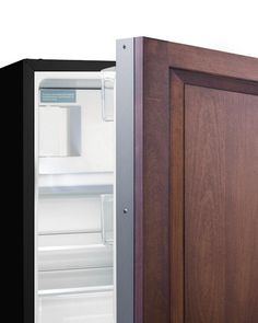 an open refrigerator with the door ajar