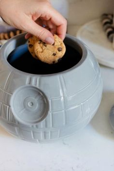 It's time to harness the power of this fully-armed and operational Star Wars Death Star Ceramic Jar for your kitchen or office. With the ability to make converts of the strongest rebels, this cookie jar beckons all who walk past it from the Dark Side. CARE INSTRUCTIONS Hand-wash only Not microwave safe | Toynk Star Wars Death Star Ceramic Cookie Jar Container in Grey at Urban Outfitters Star Wars Kitchen, Star Wars Cookies, Star Wars Love, Ceramic Cookie Jar, Star Cookies, Think Geek, Tools Kitchen, Naha, Love Stars