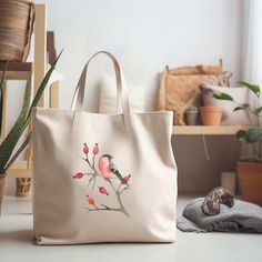 This farmers market-style canvas tote is a great for every day use or as a gift for someone special. You can use it for a trip to the market or for your day at the spa or Yoga studio.  We use a high quality professional direct to garment (DTG) process on our products, this means fabric-grade ink is printed directly onto the garment blending with the fibers. This process allows us to achieve a vintage style look on many of our designs, and a feel that is similar to screen-printing (which avoids t Casual Canvas Bag For Gift, Spring Canvas Bag Large Capacity Gift, Casual Large Capacity Canvas Bag As Gift, Beige Canvas Shoulder Bag As Gift, Casual Canvas Tote Bag For Gifts, Casual Tote Canvas Bag As Gift, Beige Canvas Shoulder Bag Gift, Beige Canvas Shoulder Bag For Gift, Beige Canvas Bag As A Gift