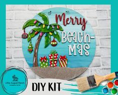 a sign that says merry beach - mas with a palm tree and presents